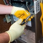 Hispanic air conditioning technician